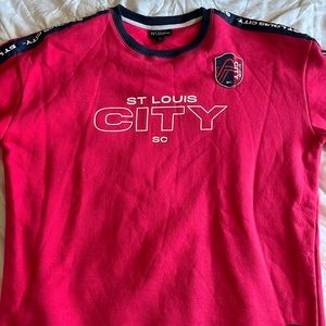 Authentic St. Louis soccer sweater with matching pants. Lightly worn.